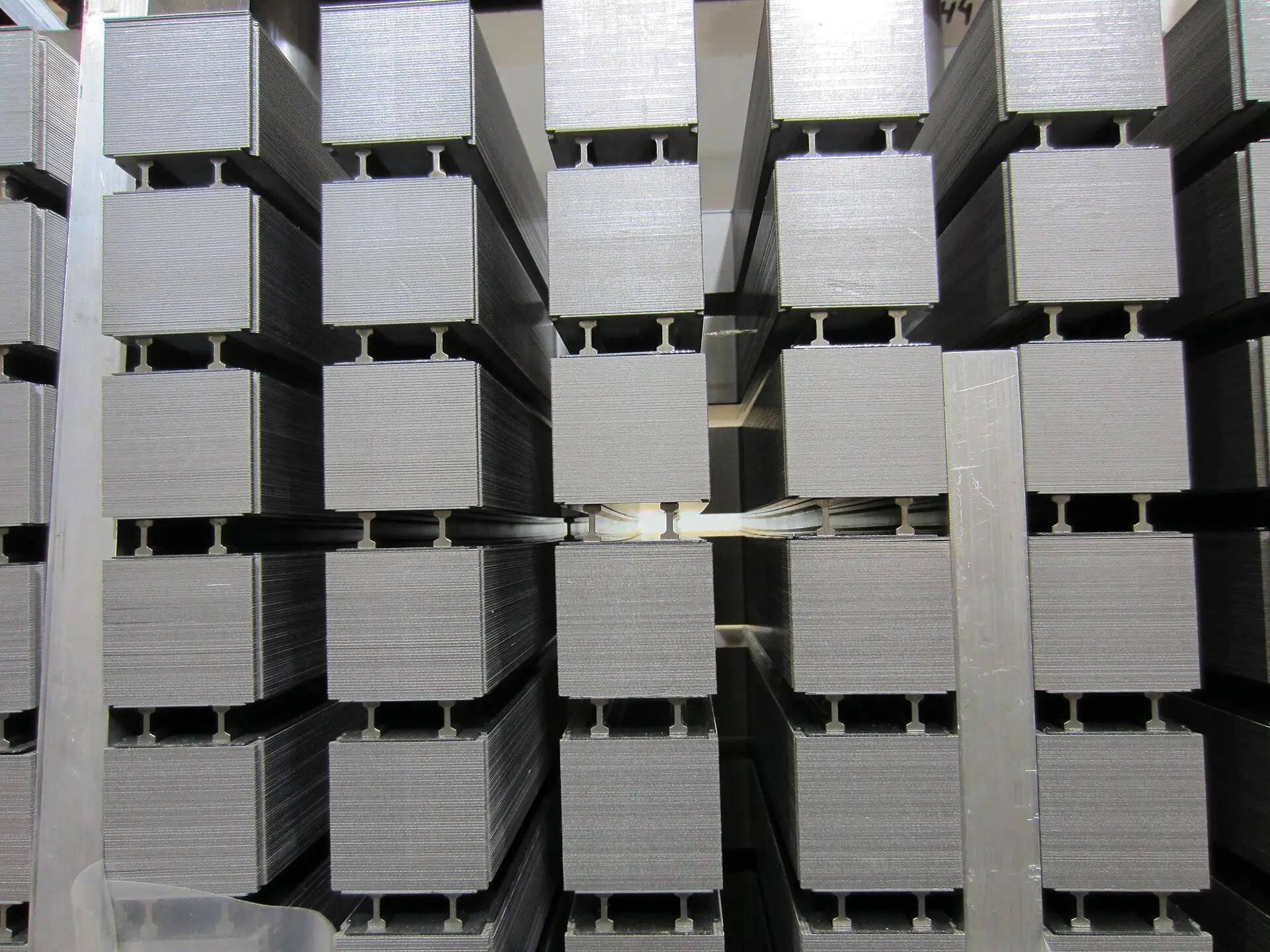 Laminated sections and ventilation slots of a generator stator core during assembly.